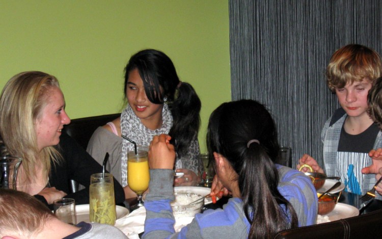 Alana, Karmilla and Chris enjoying the evening